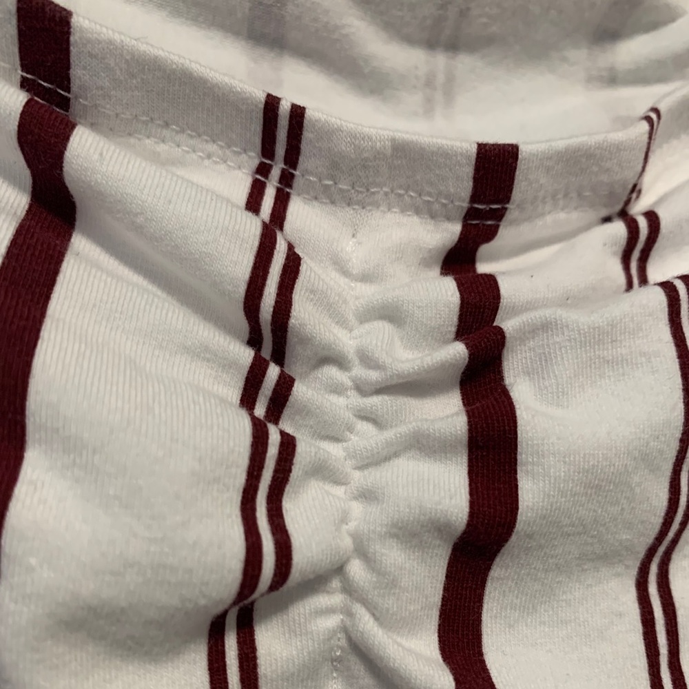 Off the shoulder shirt with cute cinched detail.